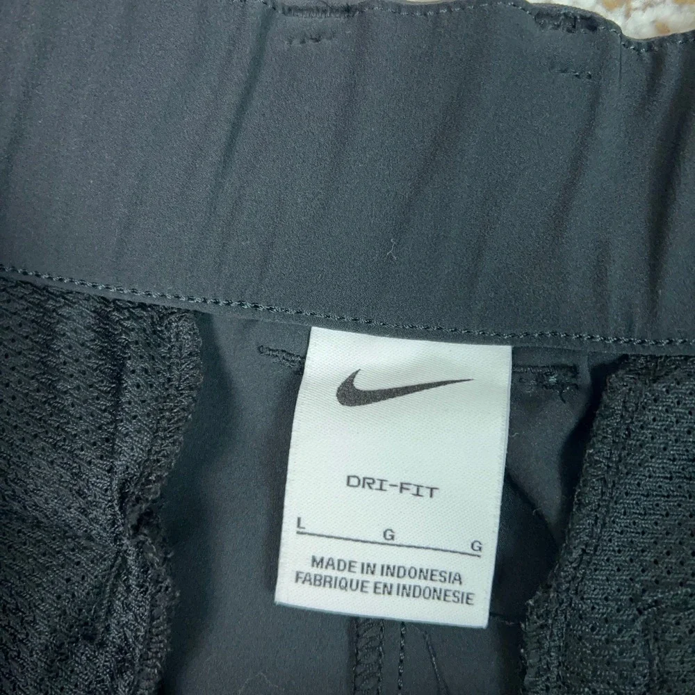 Nike Pants Womens Large Black Comfort Dri-FIT Golf Tapered Stretch Trousers Logo
